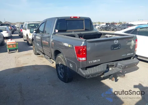 2015 Nissan Titan Pro-4X from USA, damaged, VIN 1N6BA0EC6FN512573